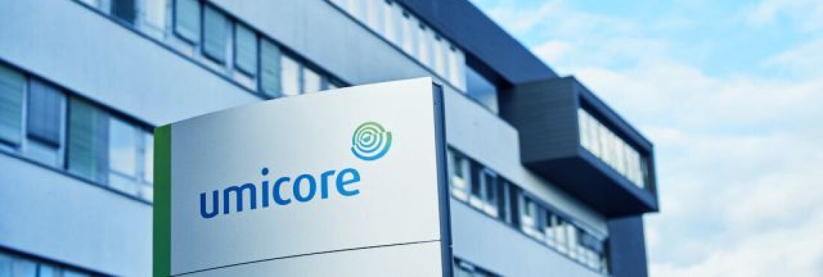 Umicore headquarter building with a logo in the front